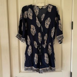 V neck romper. Navy size small.